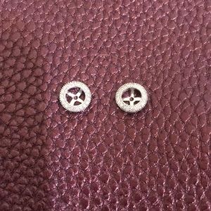 Diamond and white gold earring jackets.